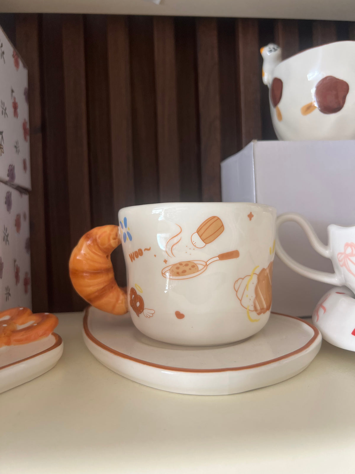 Croissant Handle Ceramic Cup & Saucer