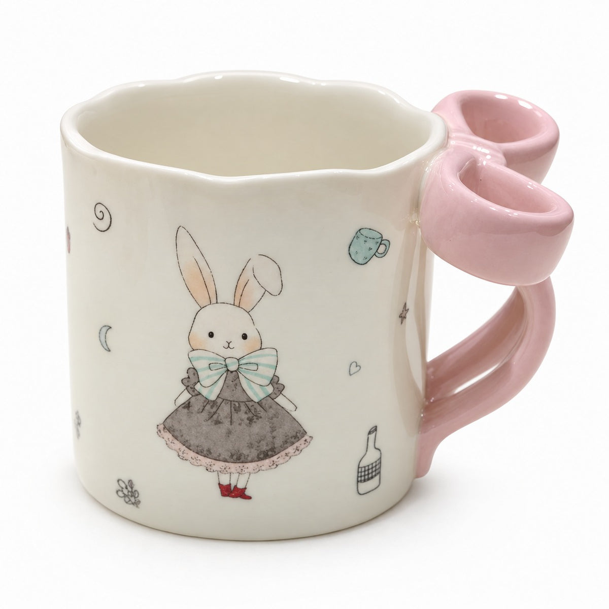 Ceramic mug with bunny illustration and pink bow-shaped handle